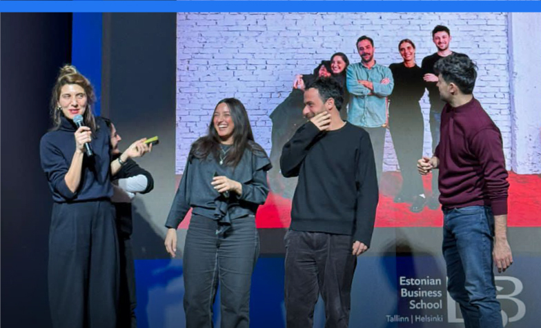 A group of people on stage

Description automatically generated